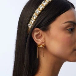 GOLD BOW STUD EARRINGS -Lele Sadoughi Shop lele sadoughi earrings one size gold pre order gold bow stud earrings 36582244909218