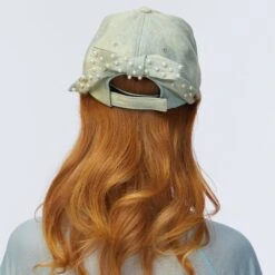 FADED DENIM BOW EMBELLISHED DENIM BASEBALL CAP -Lele Sadoughi Shop lele sadoughi hats one size faded denim bow embellished denim baseball cap 36786279317666
