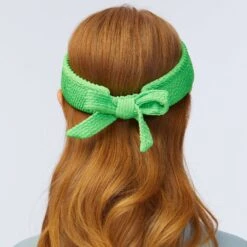 PARAKEET SWIMMER BOW TIE VISOR -Lele Sadoughi Shop lele sadoughi hats one size parakeet swimmer bow tie visor 36786249990306