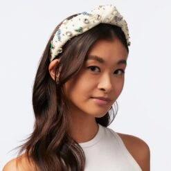 IVORY DALLAS MAVERICKS EMBELLISHED KNOTTED HEADBAND -Lele Sadoughi Shop lele sadoughi headbands one size ivory dallas mavericks embellished headband 36579248046242