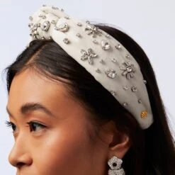 SILVER SNOW SWAROVSKI® SNOWFLAKE KNOTTED HEADBAND -Lele Sadoughi Shop lele sadoughi headbands one size silver snow swarovski snowflake knotted headband 36206411284642