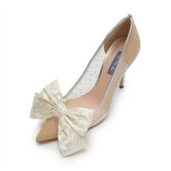 LELE X SJP IVORY PEARL BOW SHOE CLIPS -Lele Sadoughi Shop lele sadoughi shoe clips one size lele x sjp ivory silky pearl bow shoe clips 36077009993890